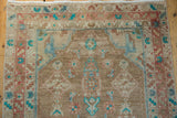 Even wear across the knot heads of a vintage Hamadan runner showing turquoise Herati motifs.