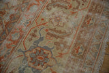 Amritsar square carpet's Herati design, low pile, exposed foundation, beige, terra cotta, dusty teal.
