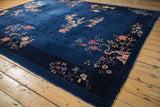 Pictorial cobalt blue Nichols Art Deco carpet showing raspberry blossoms and lotus flowers.