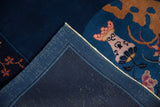 Blue pictorial Art Deco rug with woven foundation and intact blue side selvage.