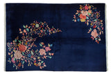 Vintage Chinese Art Deco carpet with cobalt blue and oversized raspberry, jade floral sprays.