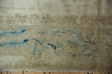Distressed antique Peking carpet border with powder and sapphire blue peacock design and fringe.