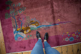 Vintage Nichols Art Deco rug, dusty mauve pictorial landscape with houses, moon, and feet.