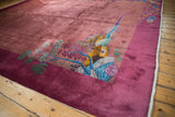 Vintage Chinese Nichols Art Deco carpet corner: pictorial landscape of houses and water in mauve and blue.