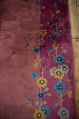 Dual raspberry hues on vintage Chinese Art Deco carpet pile with blue and saffron floral branches.