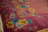 Detail of Nichols Art Deco carpet: dusty mauve border and colorful floral sprays.
