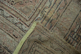 Hand-knotted Oushak rug reverse foundation, thick distressed pile, and green side selvage.