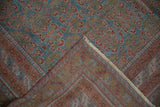 Vintage distressed Afshar carpet pile showing even wear, ocean blue, chestnut, terracotta hues, and faint foundation.