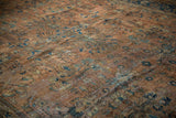 Vintage Mahal carpet, ornate dusty terracotta field with navy, teal long-stemmed vinery, abrashes.