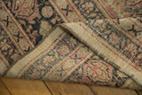 Close-up showing the hand-knotted foundation and secured sides of the vintage Mahal carpet.