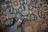 Antique Gorevan carpet: geometric field of floral motifs, vinery in cobalt blue, brick red, teal.