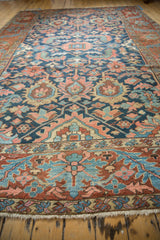 Geometric floral patterns, winding vine border, and fringe on this antique Gorevan rug.
