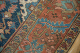 Antique Gorevan carpet: Geometric vinery connecting oversized floral cross-sections on brick red field.