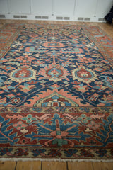 Antique Gorevan carpet: meandering vine border, floral field, in cobalt blue, brick red.