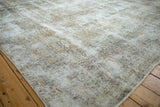 Vintage Distressed Meshed carpet showing abrashes, exposed foundation, and faint vinery.