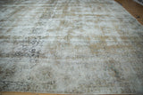 Distressed vintage Meshed carpet detail with exposed foundation, wear to knot heads, and faded beige palmettes.