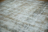 Distressed vintage Meshed rug texture with foundation, abrashes, and faint floral motifs.