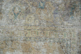 Distressed Meshed carpet detail shows textured abrashes, visible foundation, and muted floral patterns.