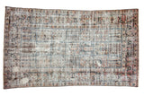 Distressed Baktiari carpet with multi-panel garden imagery in dusty red, denim blue, ivory. 5x8.5.