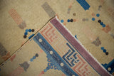 Antique Ningxia carpet, beige pile with blue cloudband motifs and dusty rose bound edge.