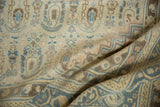 Evenly worn, low pile of a Sivas rug with boteh paisley motifs in blue and bronze.