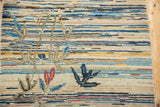 Vintage Peking rug corner, germinating eucalyptus plant on ivory field with colorful horizontal striations.