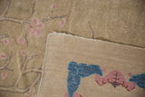 Antique Chinese Art Deco rug with intact side selvage and woven foundation.
