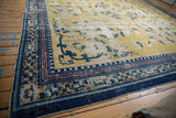 Antique Ningxia carpet border displays saffron, cobalt blue, and pearl patterns with knot head wear.
