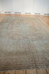 Distressed Kayseri carpet, faded dusty rose patterns, showing foundation wear and border.