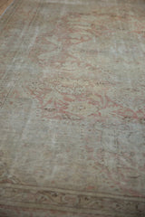 Distressed vintage Kayseri rug pile, showing foundation and faded dusty rose motifs.