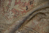 Distressed vintage Kayseri rug with dusty rose and beige tones, showing wear to knot heads.