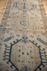 Long view of a vintage Karaja runner showing its time-softened texture and geometric motifs.