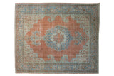Vintage Distressed Khoy Carpet with a dusty tangerine field, powder blue medallion, and abrashed patina.