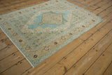 Vintage distressed Bibikabad rug, faded powder blue Herati field, and samovar turtle border.
