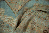 Distressed pile texture of vintage Bibikabad rug in powder blue, sand, and Herati patterns.