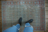 Distressed vintage Malayer rug with abrashed powder blue and soft brick red Herati pattern.
