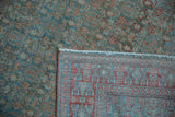 Vintage Malayer rug's distressed Herati design pile and intricate hand-knotted foundation.