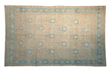 Vintage distressed Hamadan rug with a large-scale lattice pattern in sandy beige and powder blue.