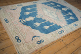 Distressed Oushak rug with short, even pile and delicate pale mauve and blue abrash.