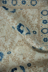 Distressed texture of vintage Sparta rug pile, with even wear across knot heads.