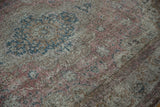 Worn texture of a distressed vintage Sparta carpet revealing visible foundation.