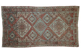 Vintage Soumac design carpet with distressed triple medallions in chestnut, powder blue, and silver.