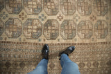 Vintage distressed Ersari rug, camel and slate geometric gul medallions, tribal borders.