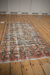Vintage Distressed Hamadan rug, worn Herati pattern, exposed ivory foundation, blue and faded red tones.