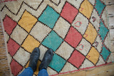 Hand-knotted vintage Moroccan rug, playful harlequin diamonds in ivory, pink, yellow, turquoise.