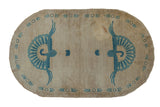 Oval vintage Art Deco rug with beige field, double blue peacock motif and geometric border.