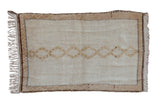 Vintage Moroccan hand-knotted rug, cream open field with interconnected brown diamonds and banded border, 2'9