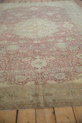 Decorative distressed vintage Kayseri carpet with time-softened cochineal red and ivory floral vinery.