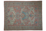 Vintage distressed Afghani Soumac carpet, geometric dragon pattern in blush, pale blue, and ivory.