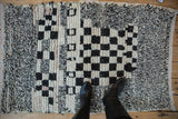 Hand-knotted vintage Moroccan rug pile, asymmetric checkered pattern, mottled ivory and charcoal.